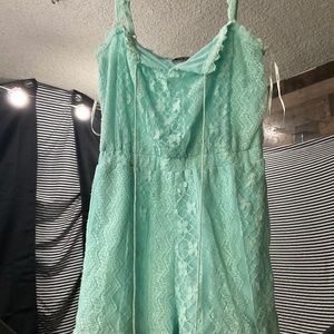 Nikibiki romper , size small, turquoise and lace pattern,